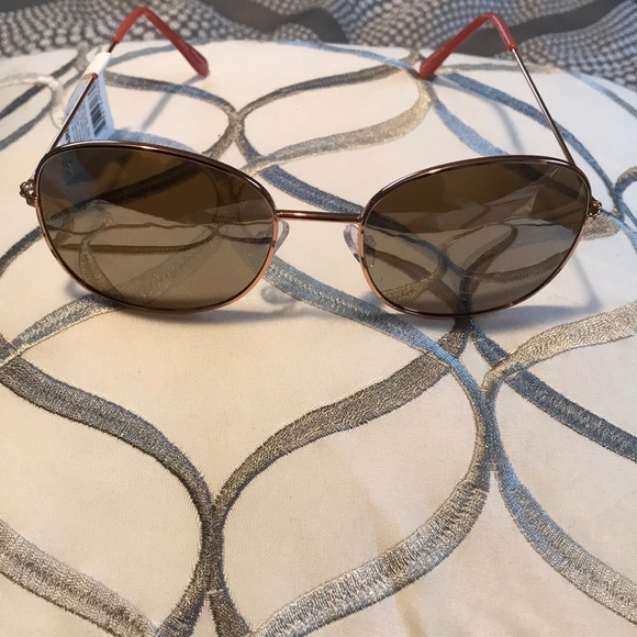 Halston Accessories - Sunglasses by Halston , gold colored lenses. NWT